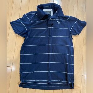 Vintage Abercrombie & Fitch Men’s Blue and White Striped Polo Shirt